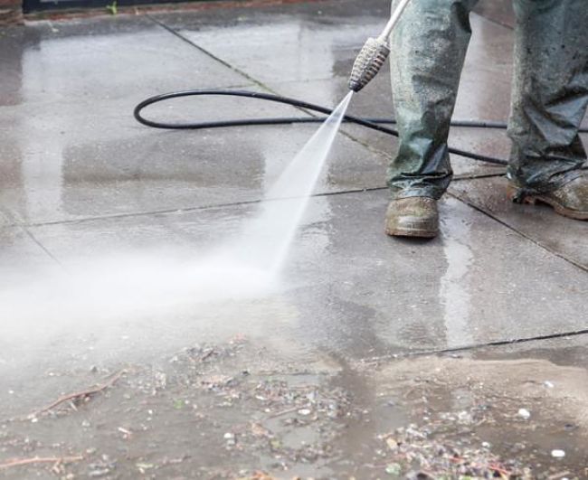 High pressure sprays are very effective for cleaning concrete